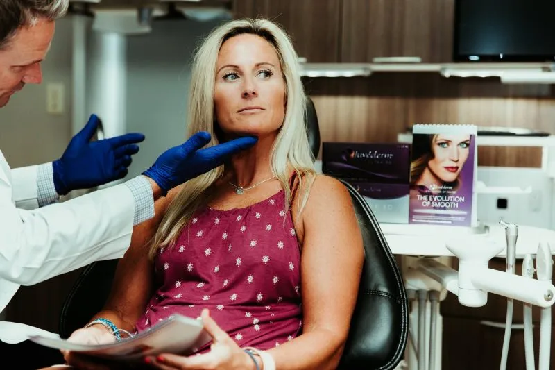Dr. Miriam Levitan Dani, D.D.S from Rolling Hills Dental assisting a dental patient